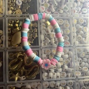 This is a flower clay bead bracelet